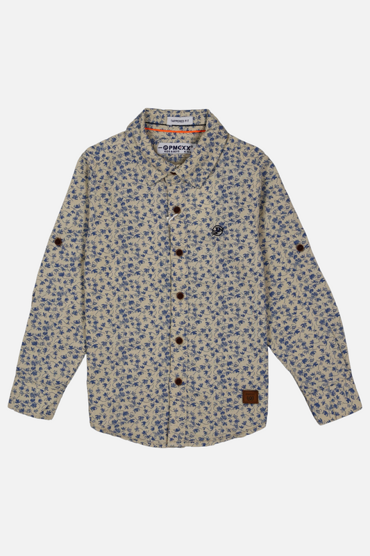 Floral patterned shirt with brown buttons on a white background