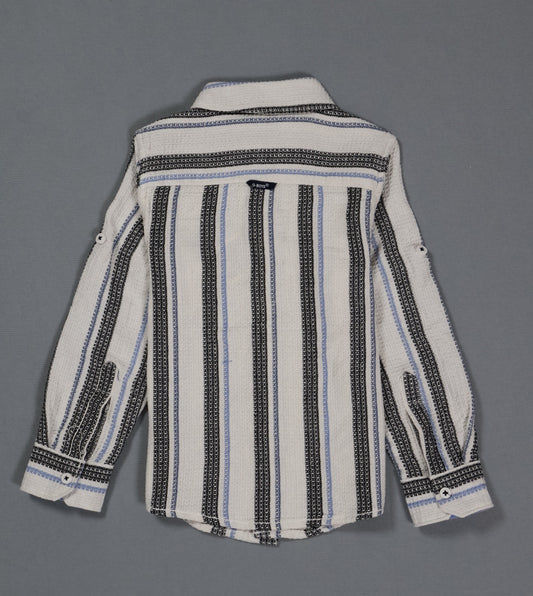 Striped shirt with black and blue patterns on a gray background