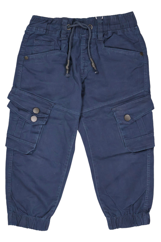 A pair of children's utility cargo pants in a deep navy blue. The pants feature a comfortable elastic waistband with a matching navy drawstring, standard side pockets, and two large cargo pockets on the legs with secure button-flap closures. They are shown as a flat lay against a neutral background.