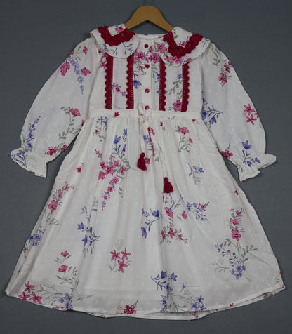 Girls long sleeve frock in pearl white with pink and purple floral print and lace detailing