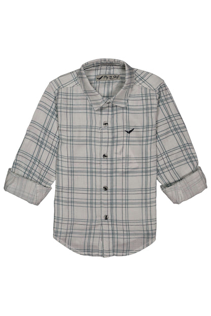 Plaid shirt with rolled-up sleeves on a white background