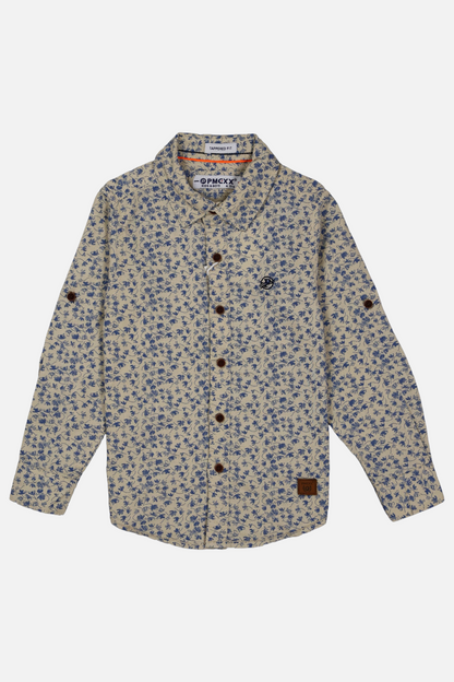 Floral patterned shirt with brown buttons on a white background