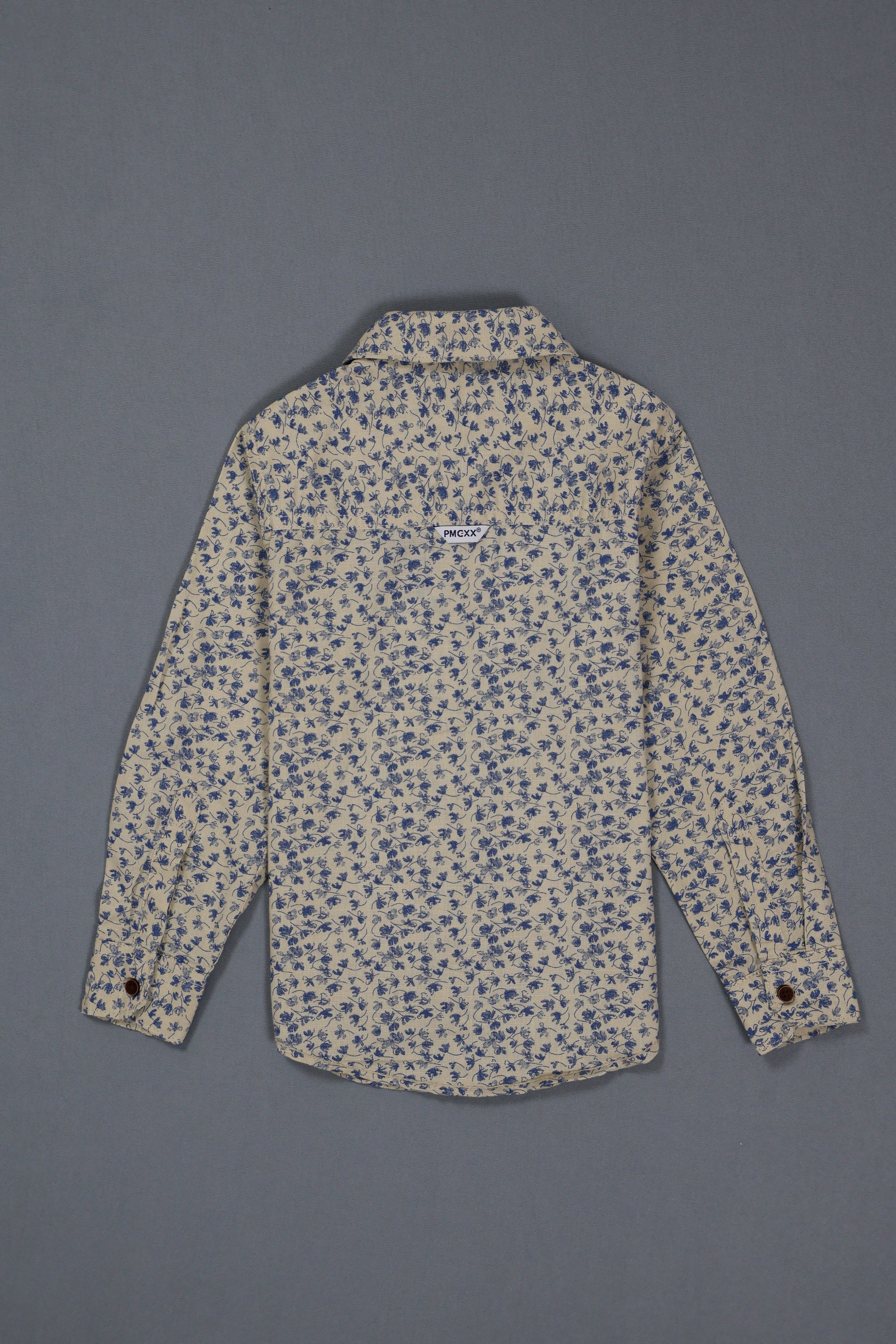 Floral-patterned shirt on a gray background