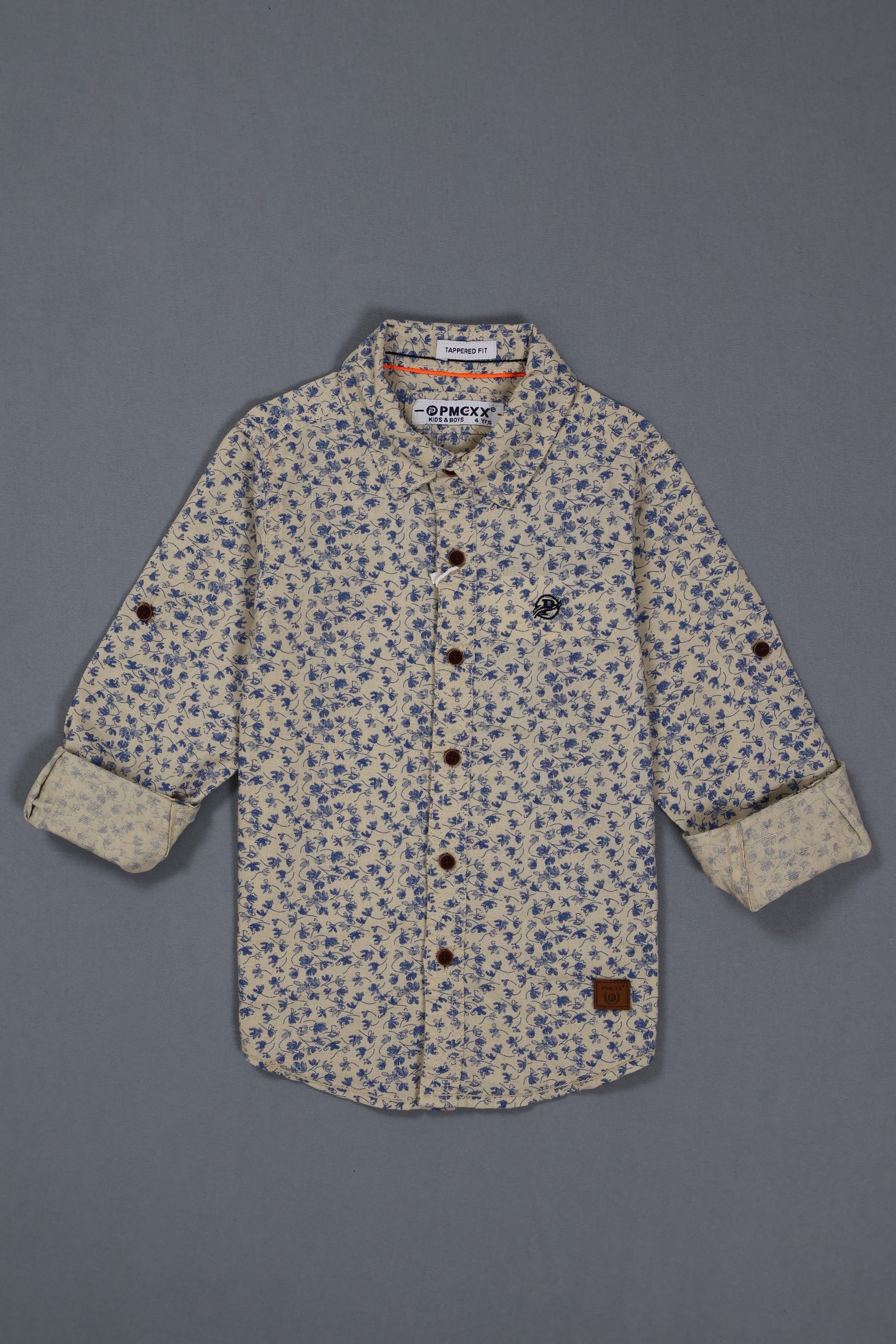 Floral-patterned shirt on a gray background