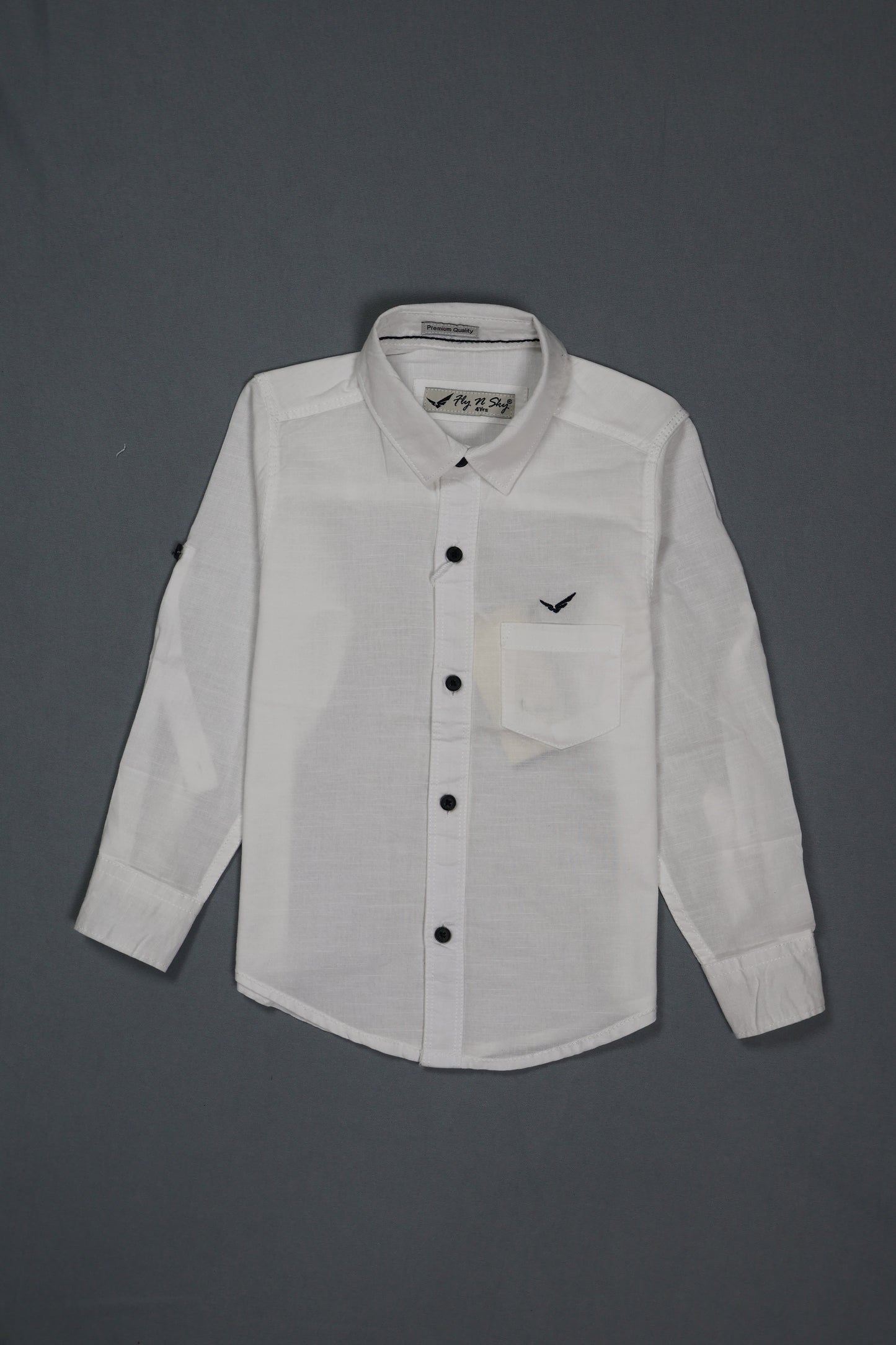 Fyst Boys' Solid White Long-Sleeve Button-Down Shirt with Subtle Textured Fabric and Single Chest Pocket, flat lay view on grey background.