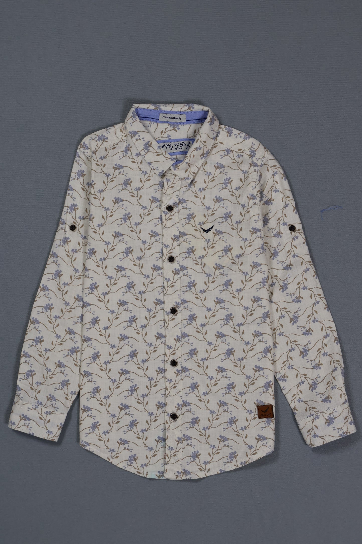 Floral patterned shirt on a gray background