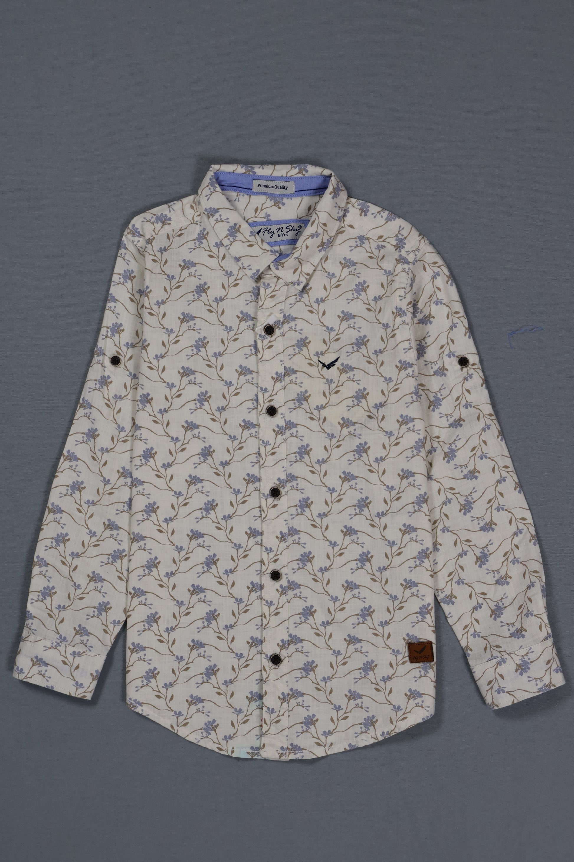 Floral patterned shirt on a gray background