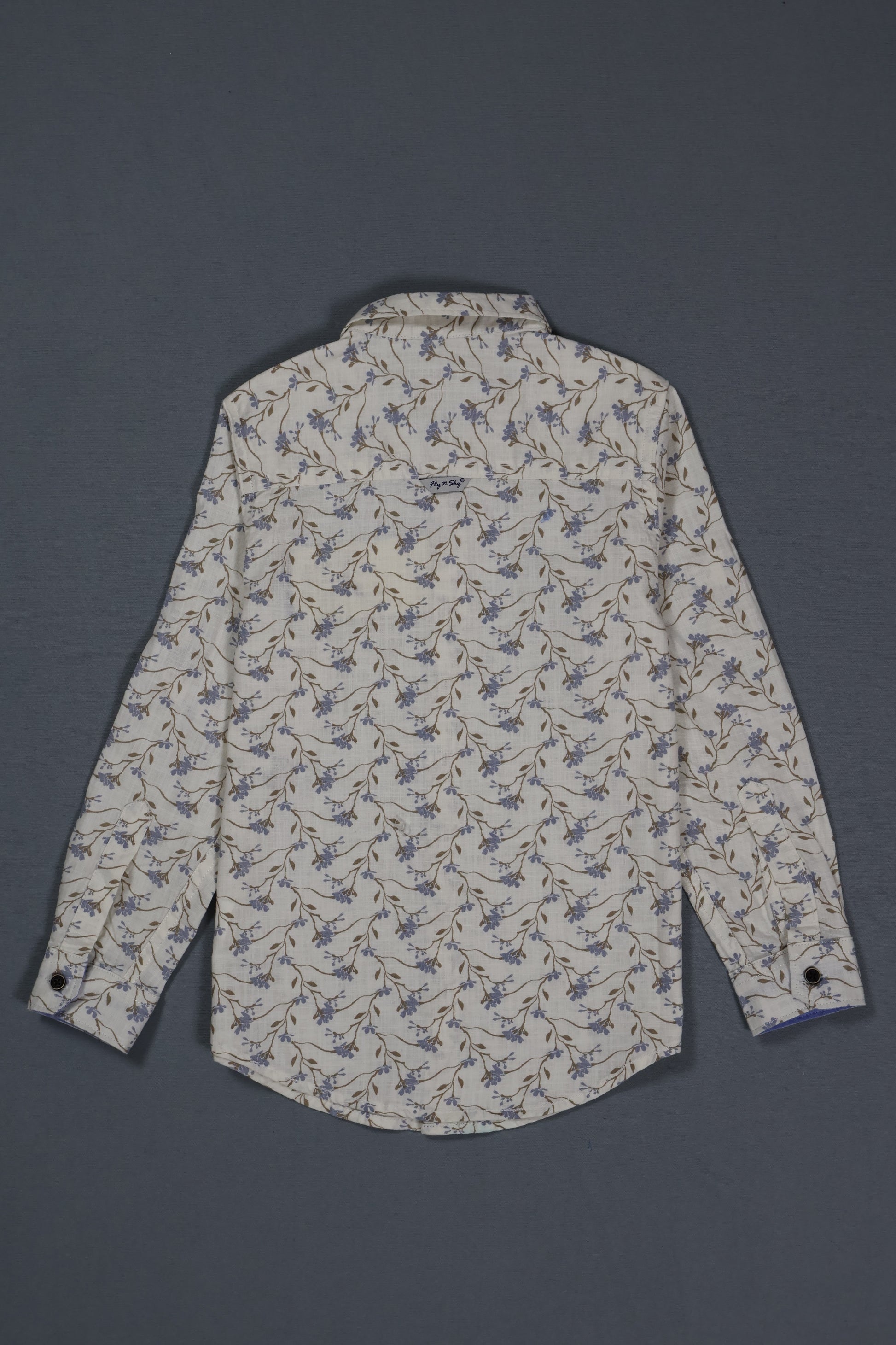 Floral patterned shirt on a dark gray background