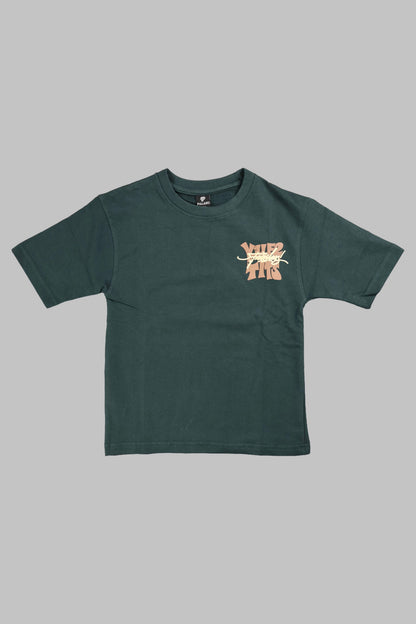 Green t-shirt with a small graphic on a gray background