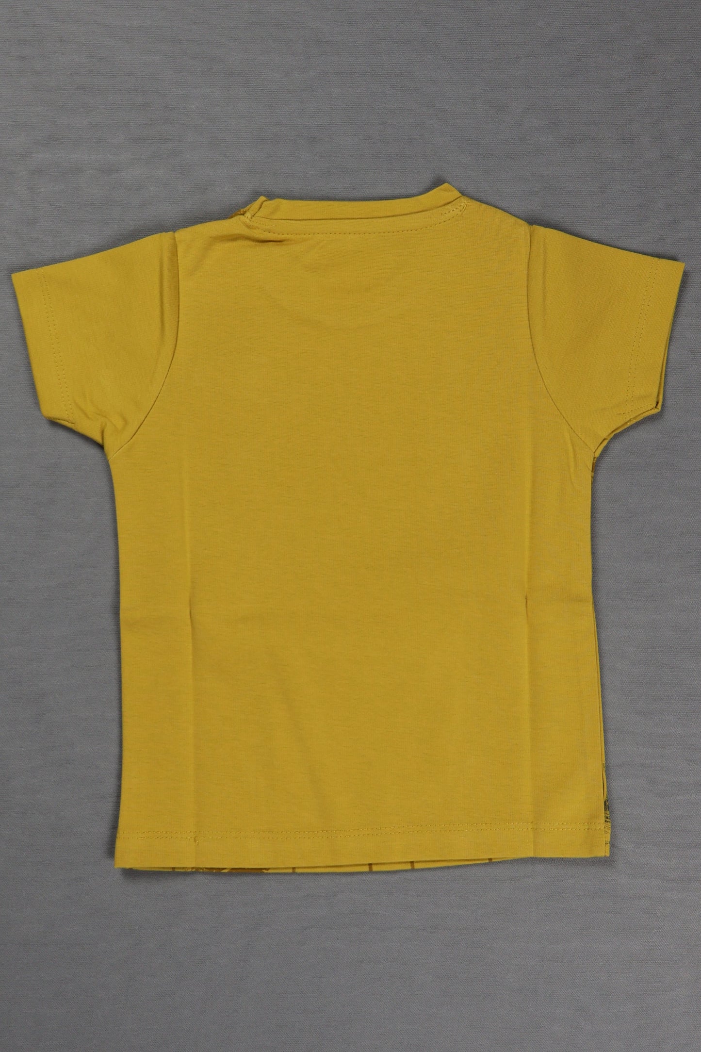 Yellow t-shirt on a gray background