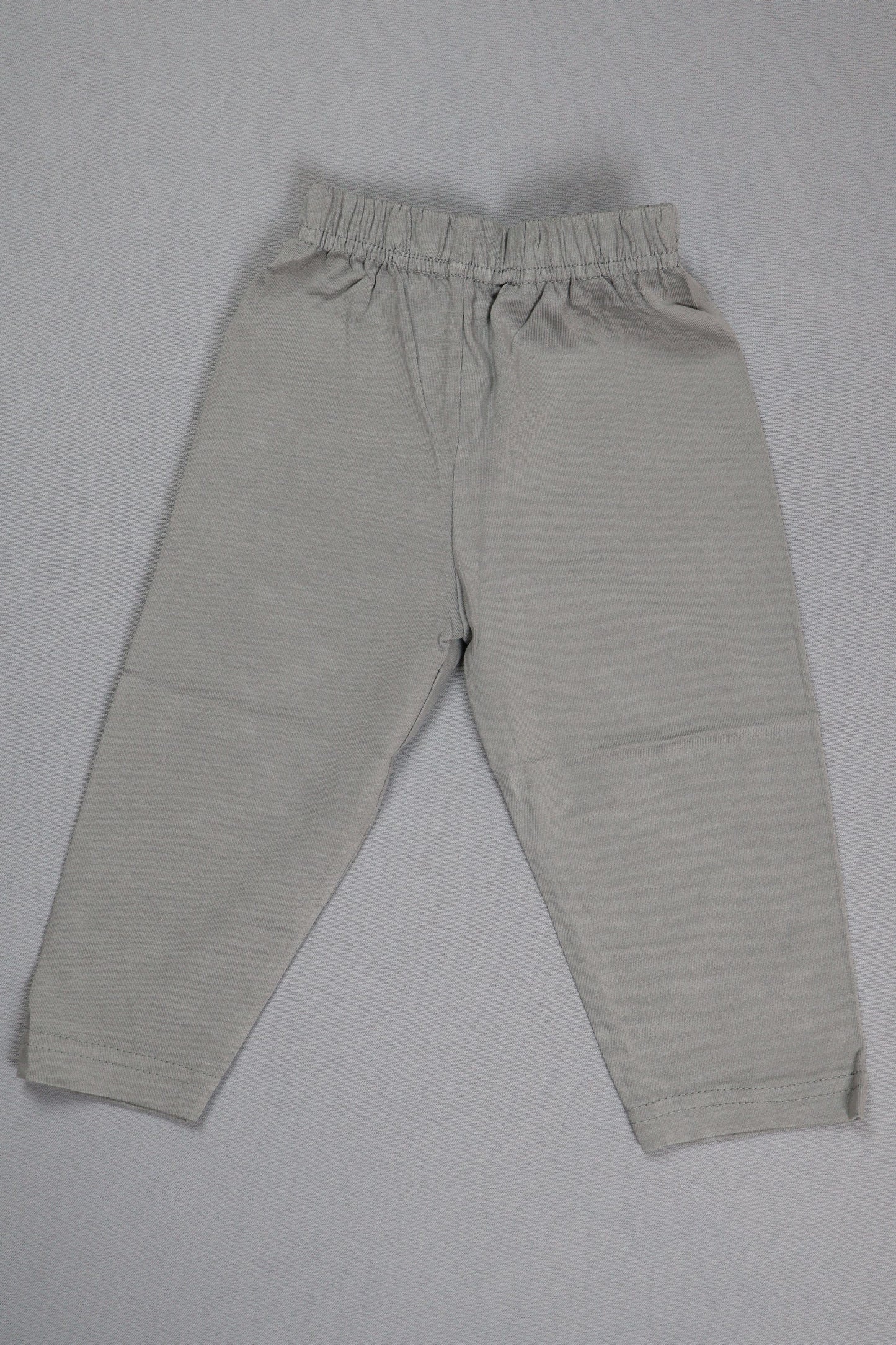 Light gray pants on a light gray background
