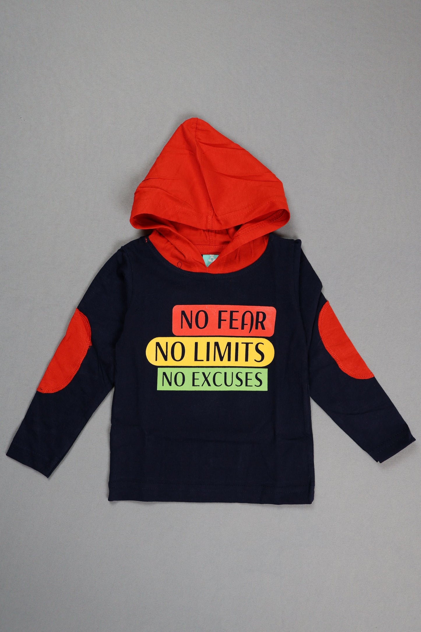 Black hoodie with red accents and motivational text on a gray background