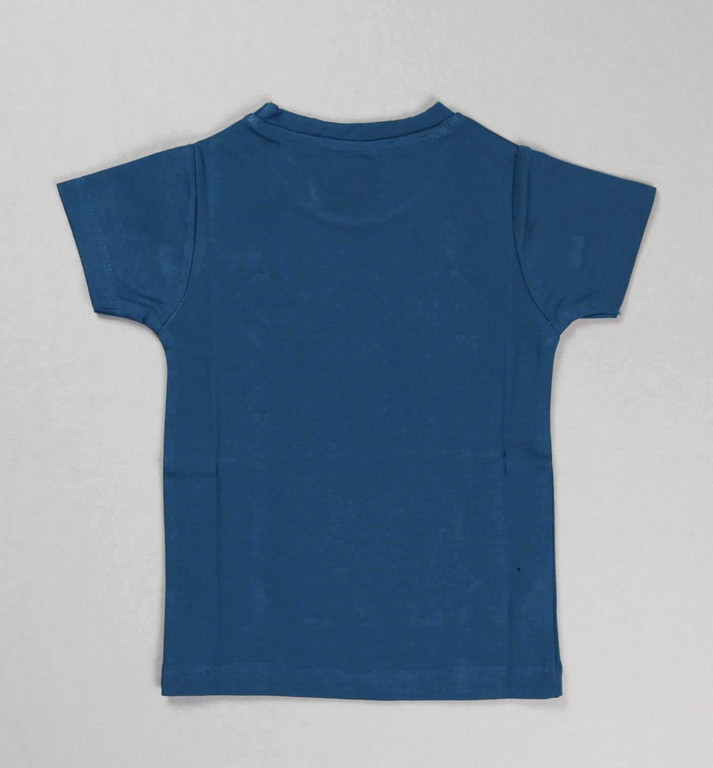 Blue t-shirt on a light gray background