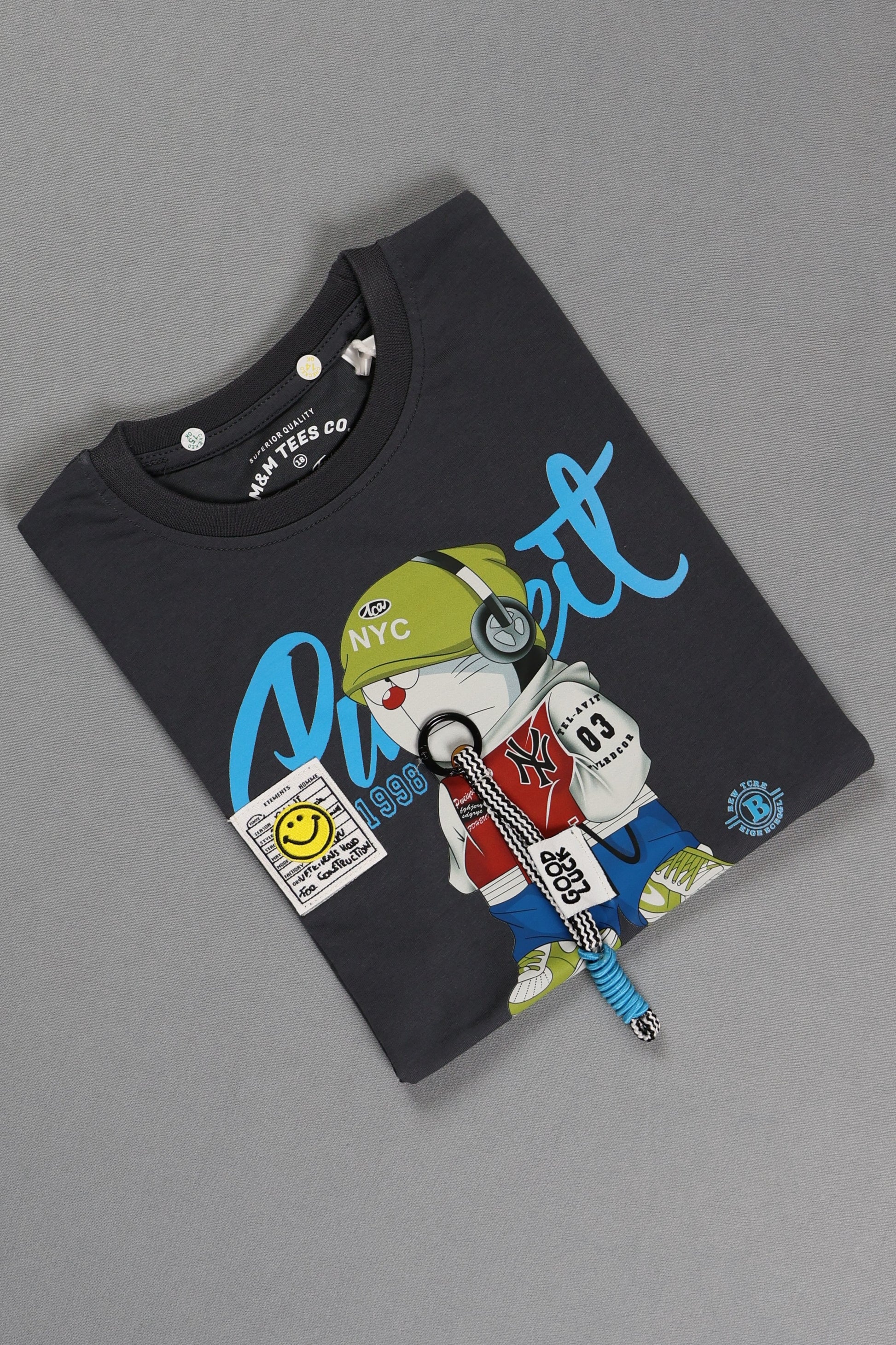 Black t-shirt with cartoon character and text on a gray background