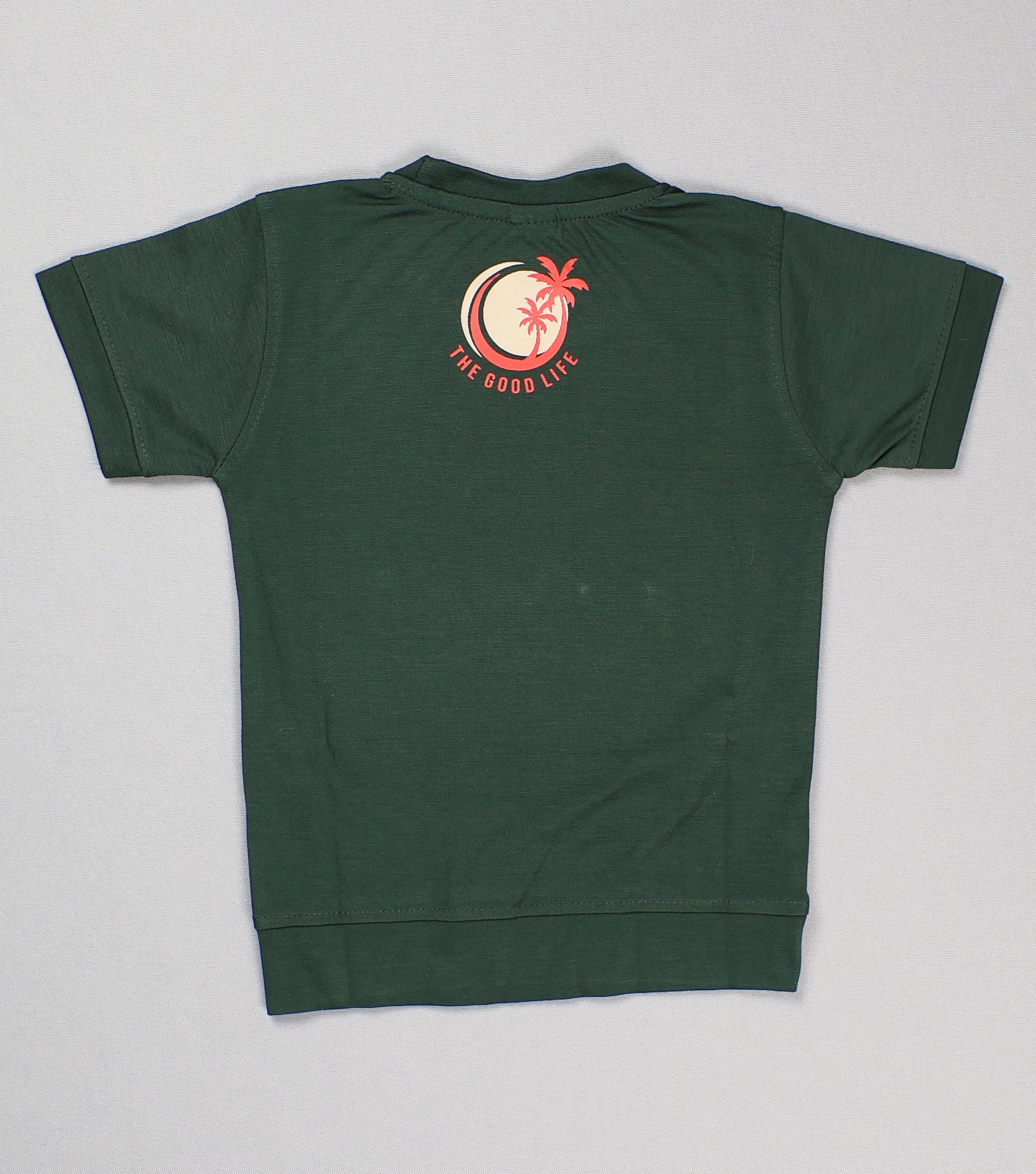 Green t-shirt with a red and white logo on the back against a light gray background