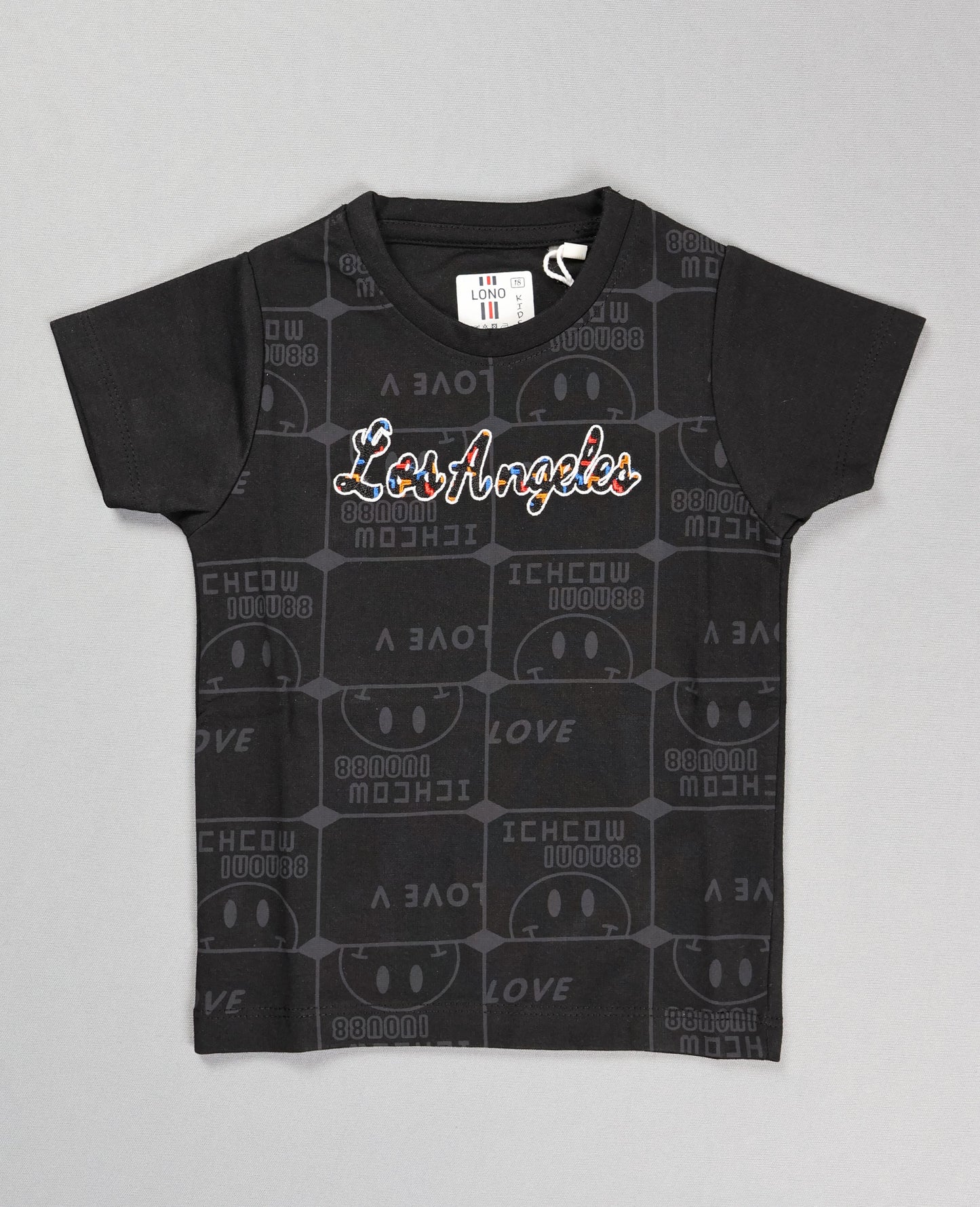 Black t-shirt with 'Los Angeles' text and smiley face pattern on a gray background