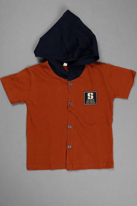 Orange shirt with a logo on a gray background