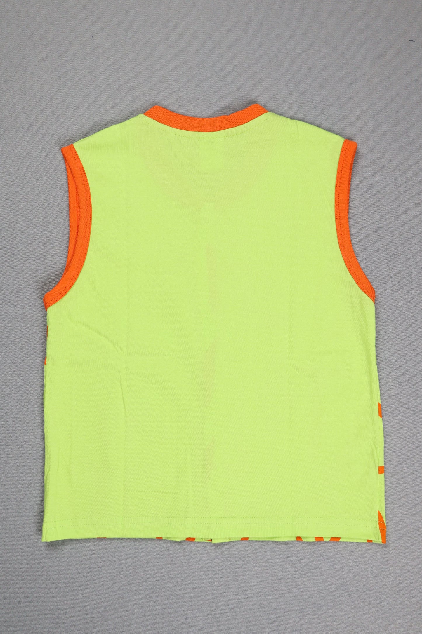 Light green sleeveless top with orange trim on a gray background