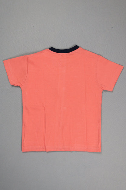 Coral sleeveless top on a gray background