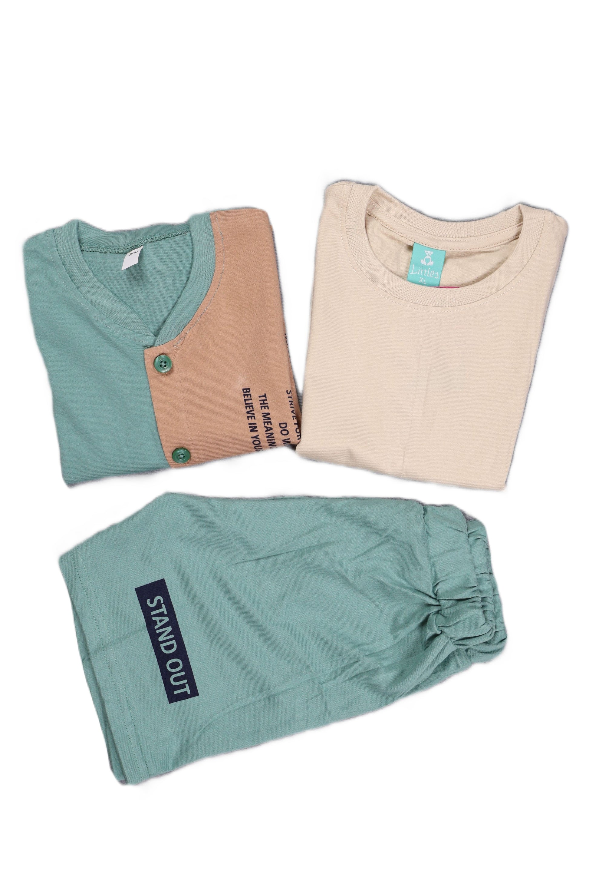 Three folded shirts in different colors on a white background