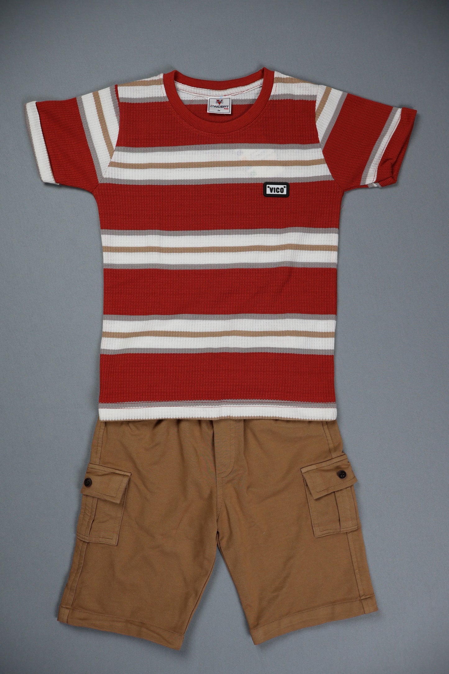Red and white striped shirt with brown shorts on a gray background