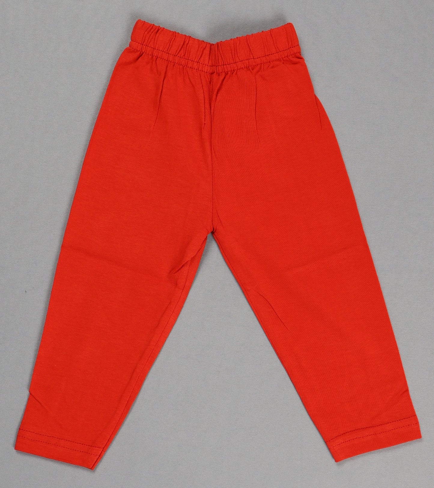 Red pants on a gray background