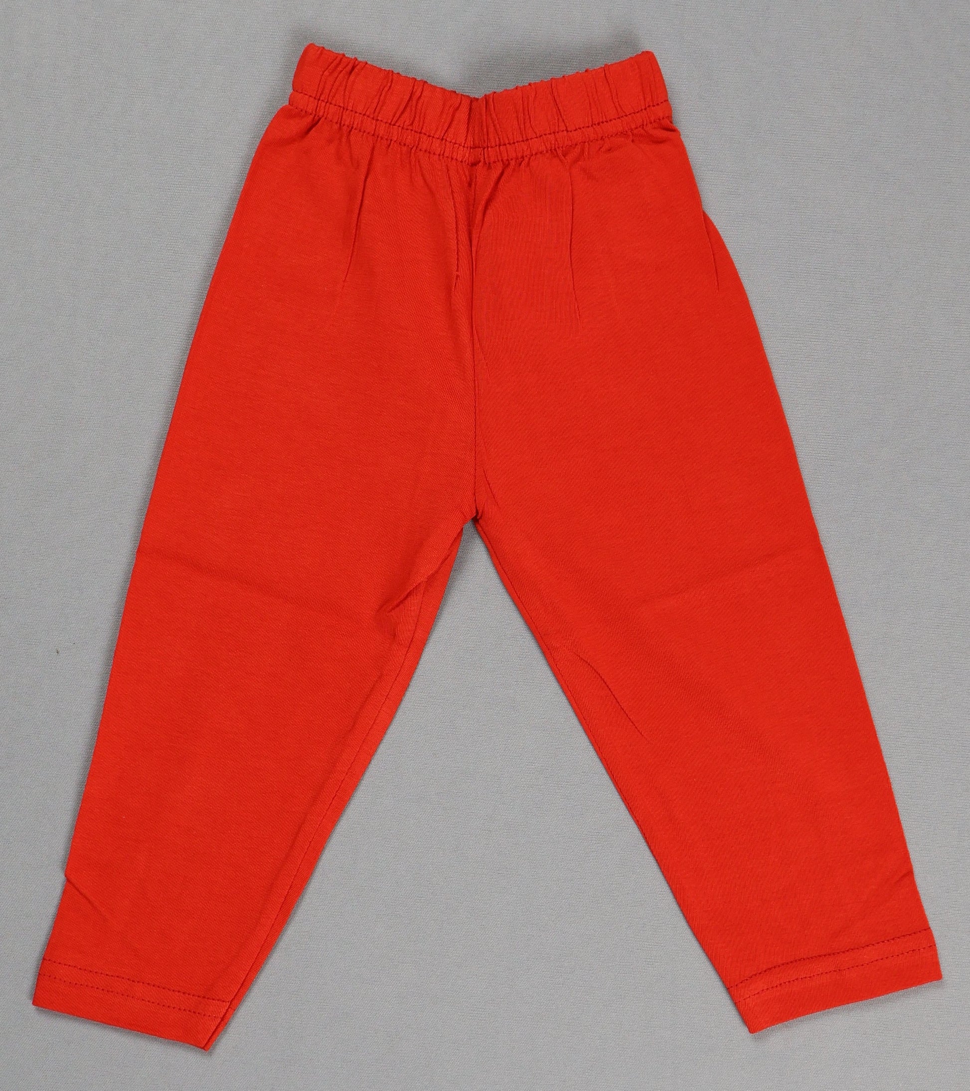 Red pants on a gray background