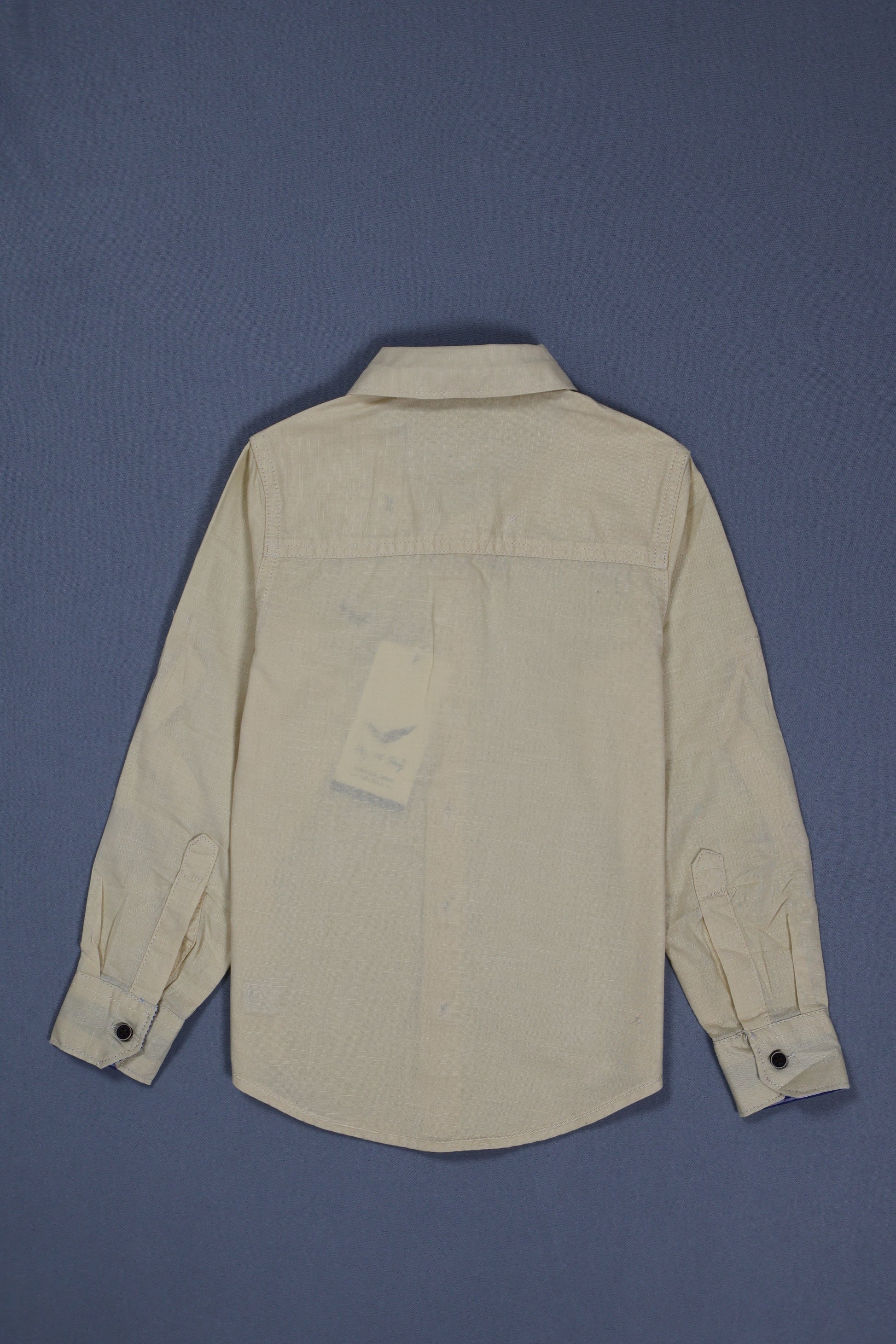 Light-colored shirt on a blue background