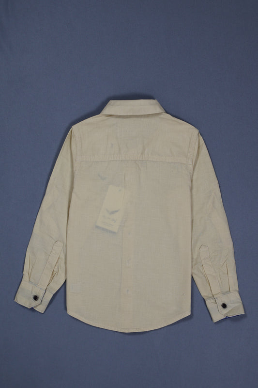 Light-colored shirt on a blue background