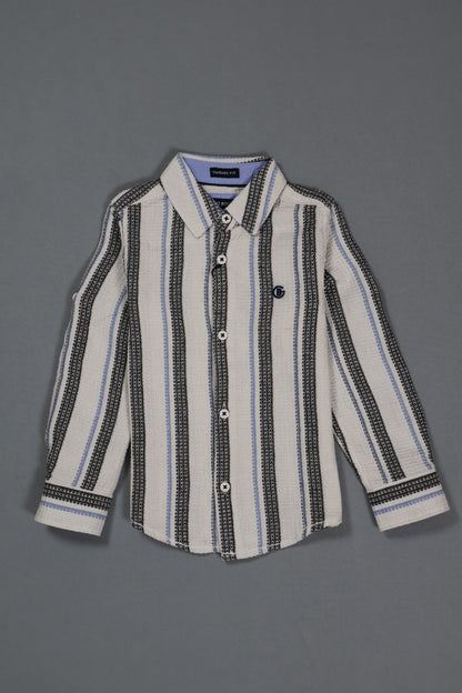Striped shirt with black and white pattern on a gray background