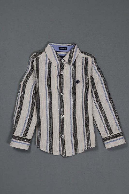 Striped shirt with black and white pattern on a gray background