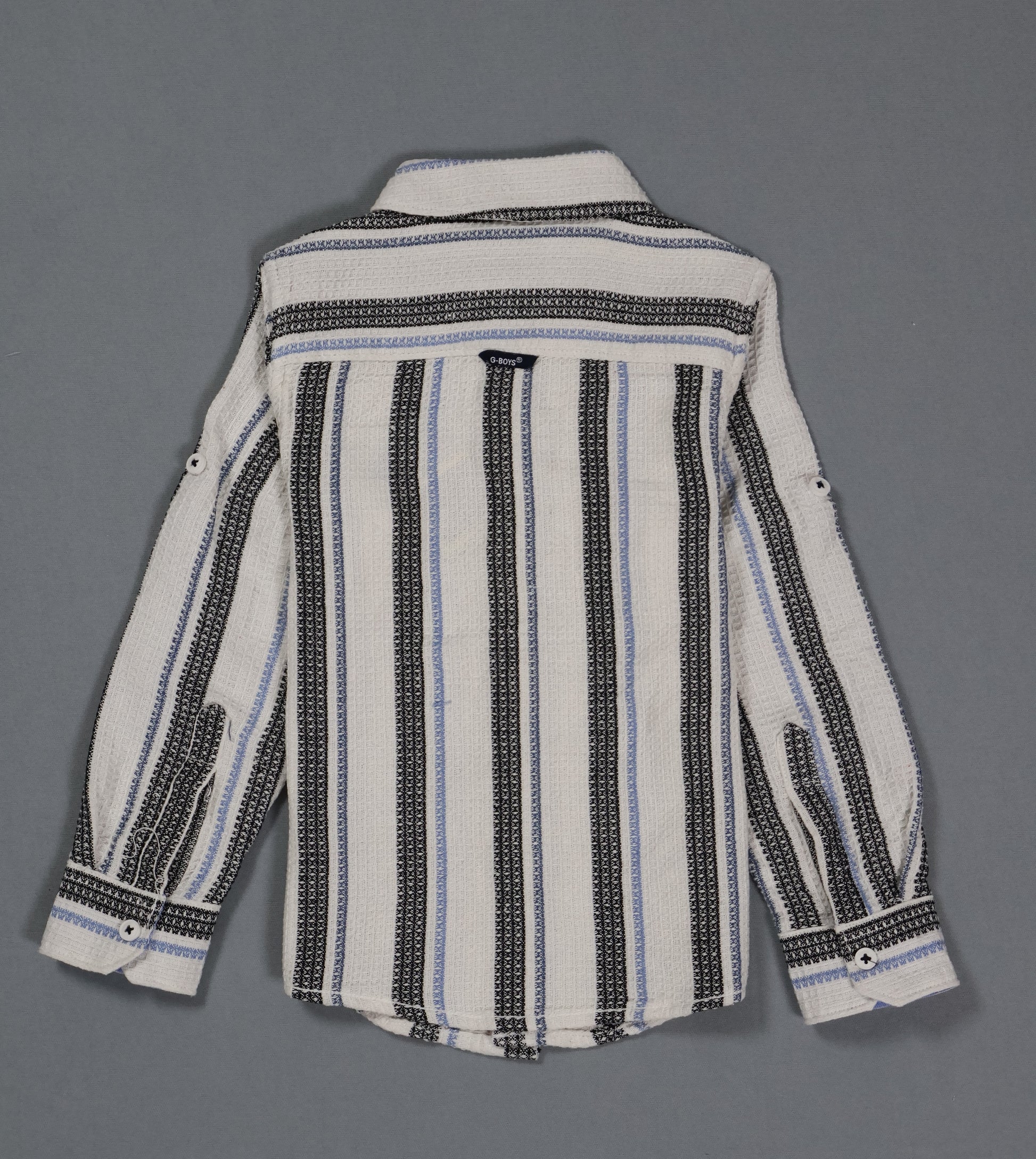 Striped shirt with black and blue patterns on a gray background