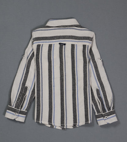 Striped shirt with black and blue patterns on a gray background