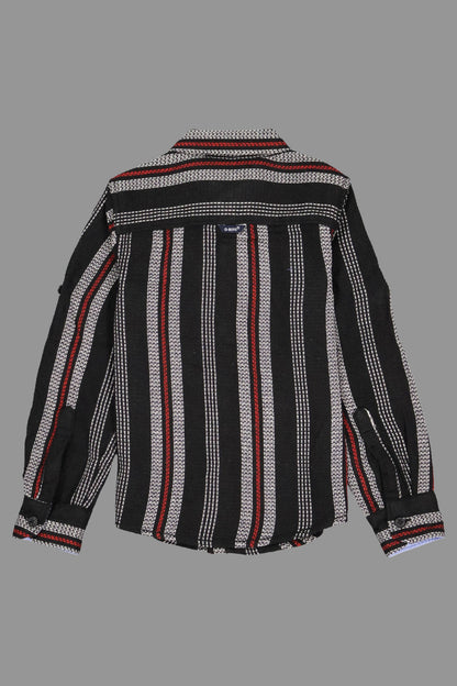 Black and white striped shirt with red accents on a gray background