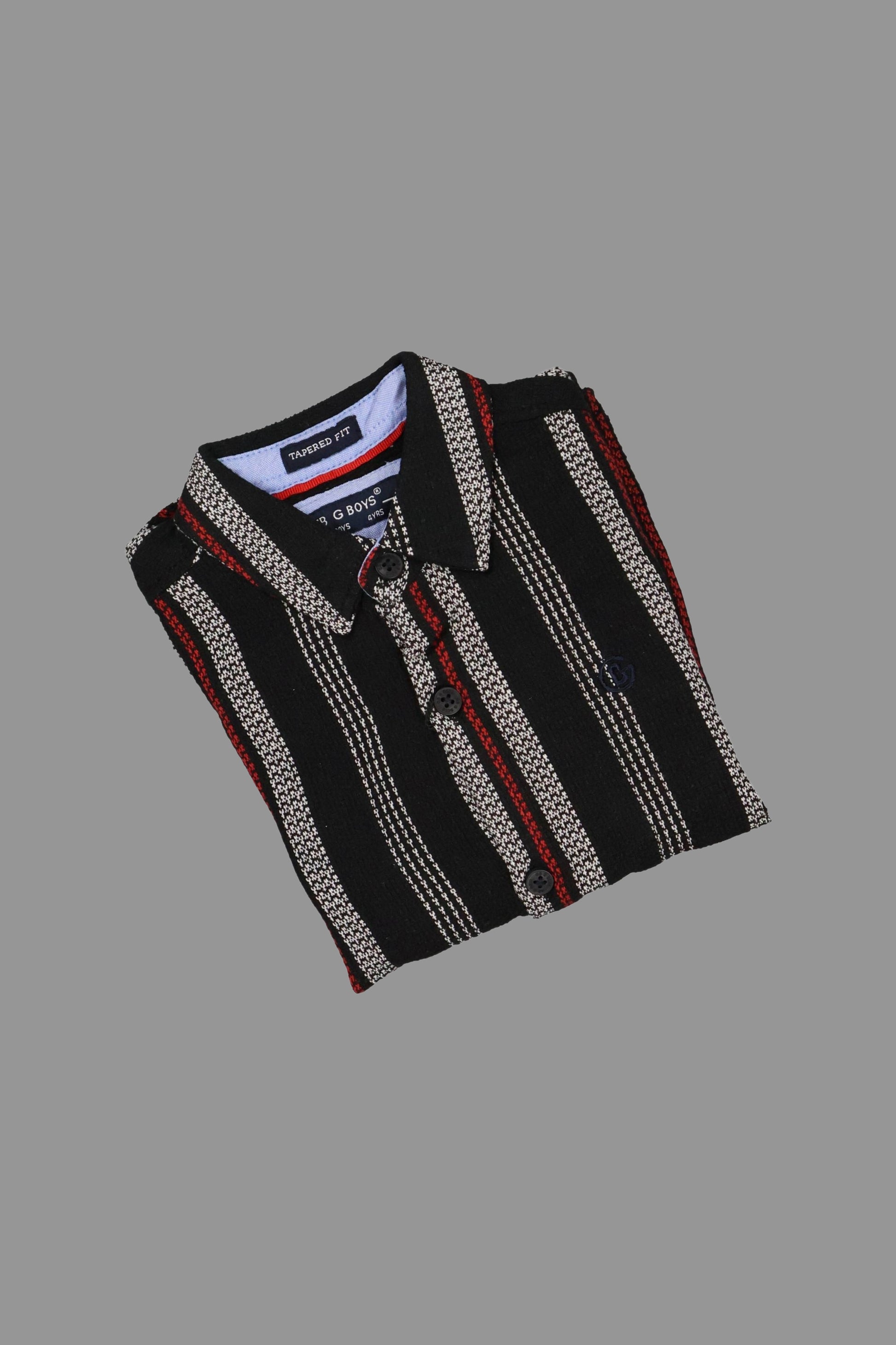 Black and red patterned shirt on a gray background