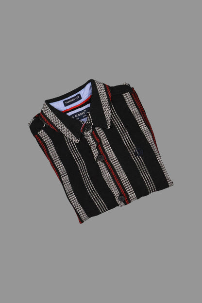 Black and red patterned shirt on a gray background