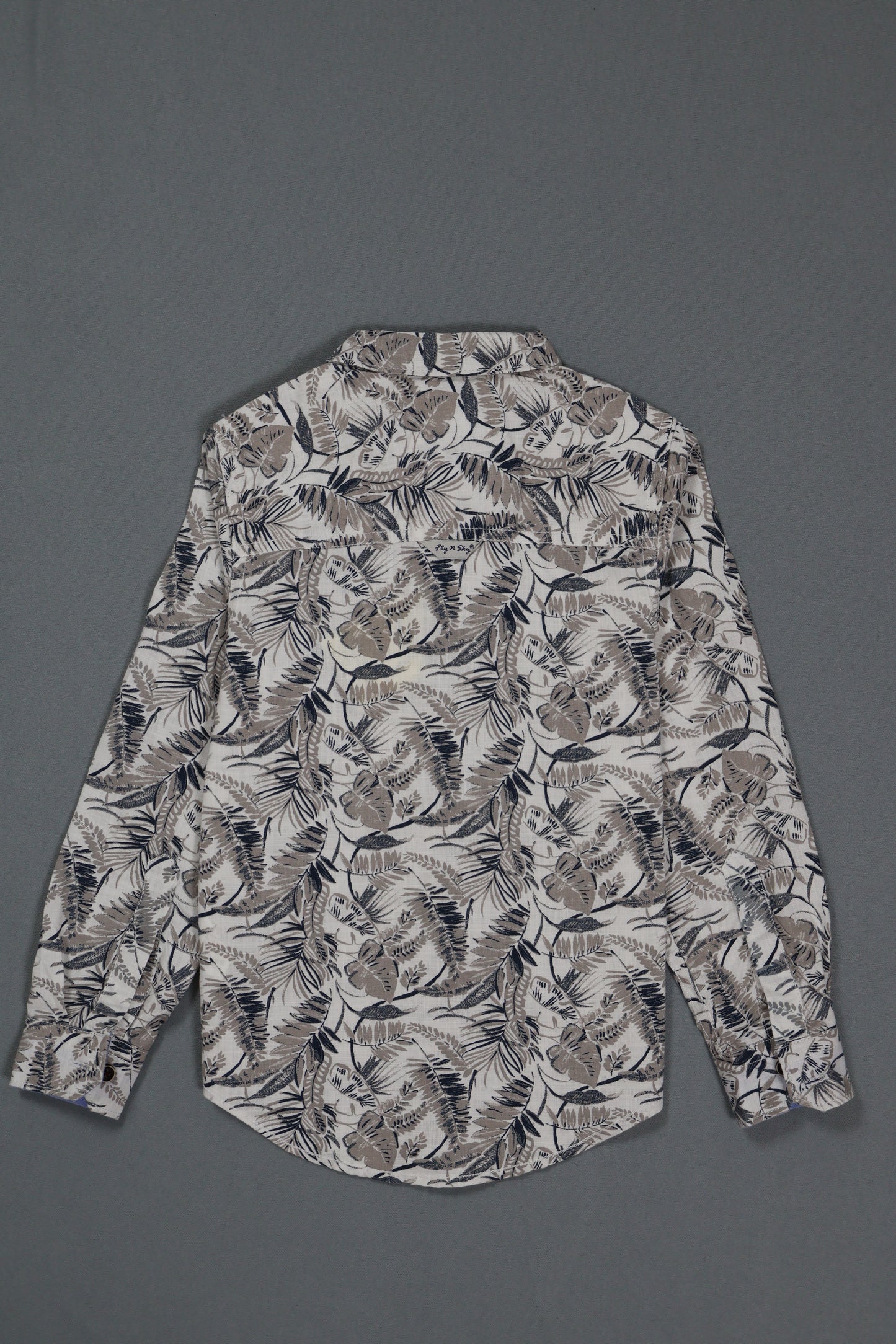 Floral patterned shirt on a gray background