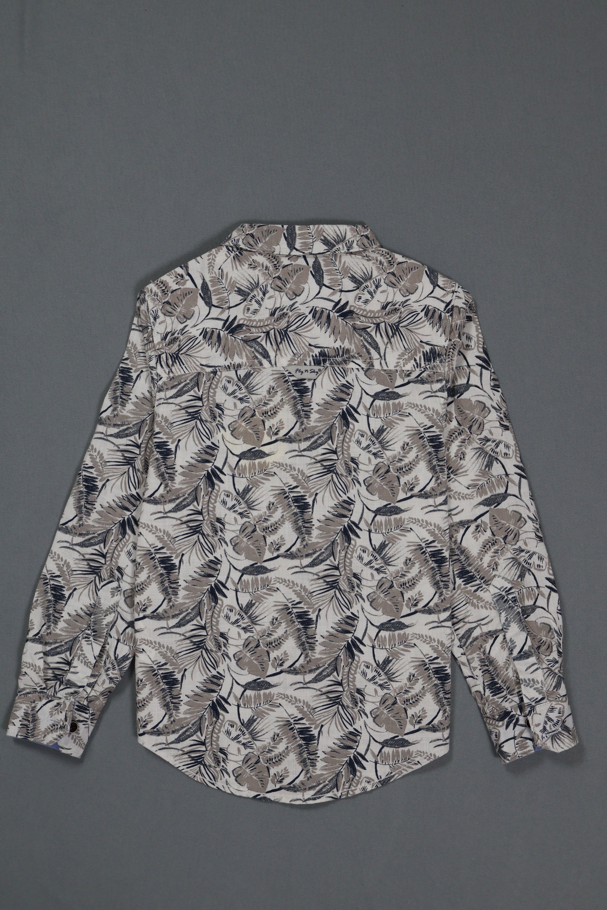 Floral patterned shirt on a gray background