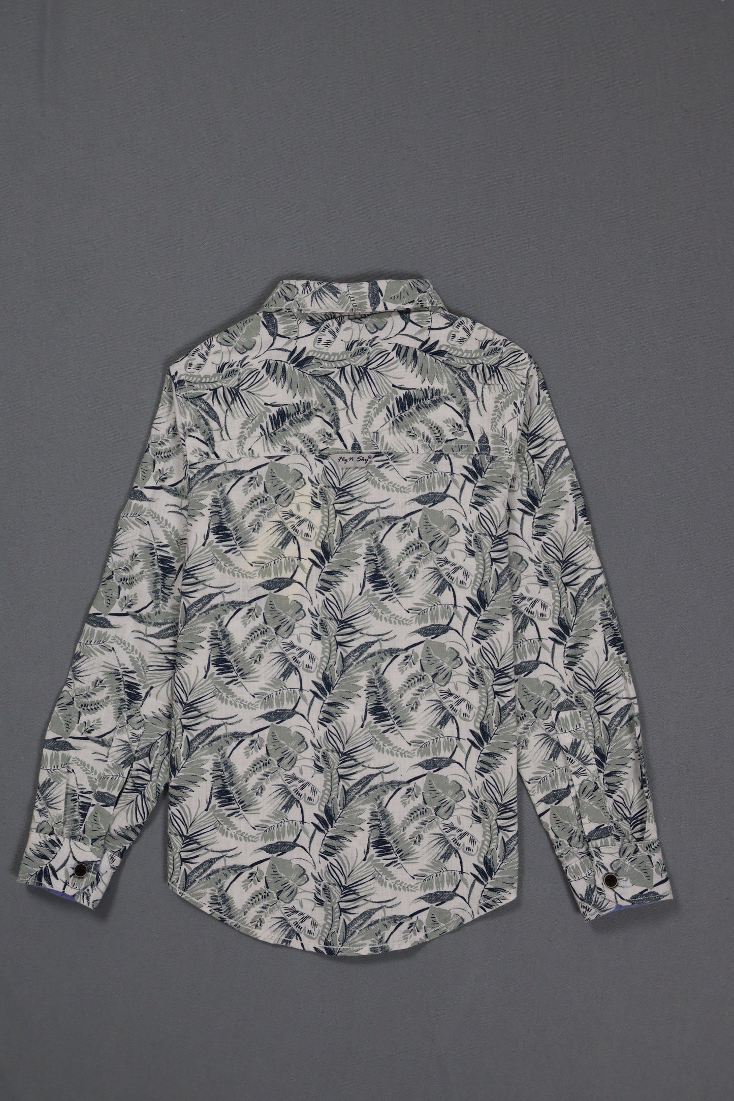 Floral patterned shirt on a gray background
