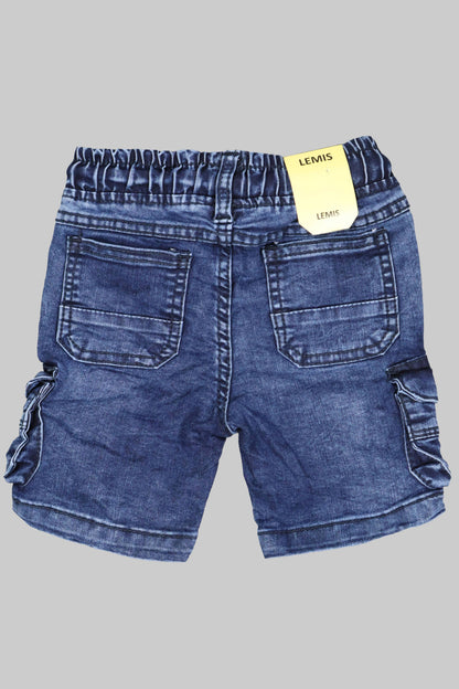 Blue denim shorts with a yellow tag on a gray background