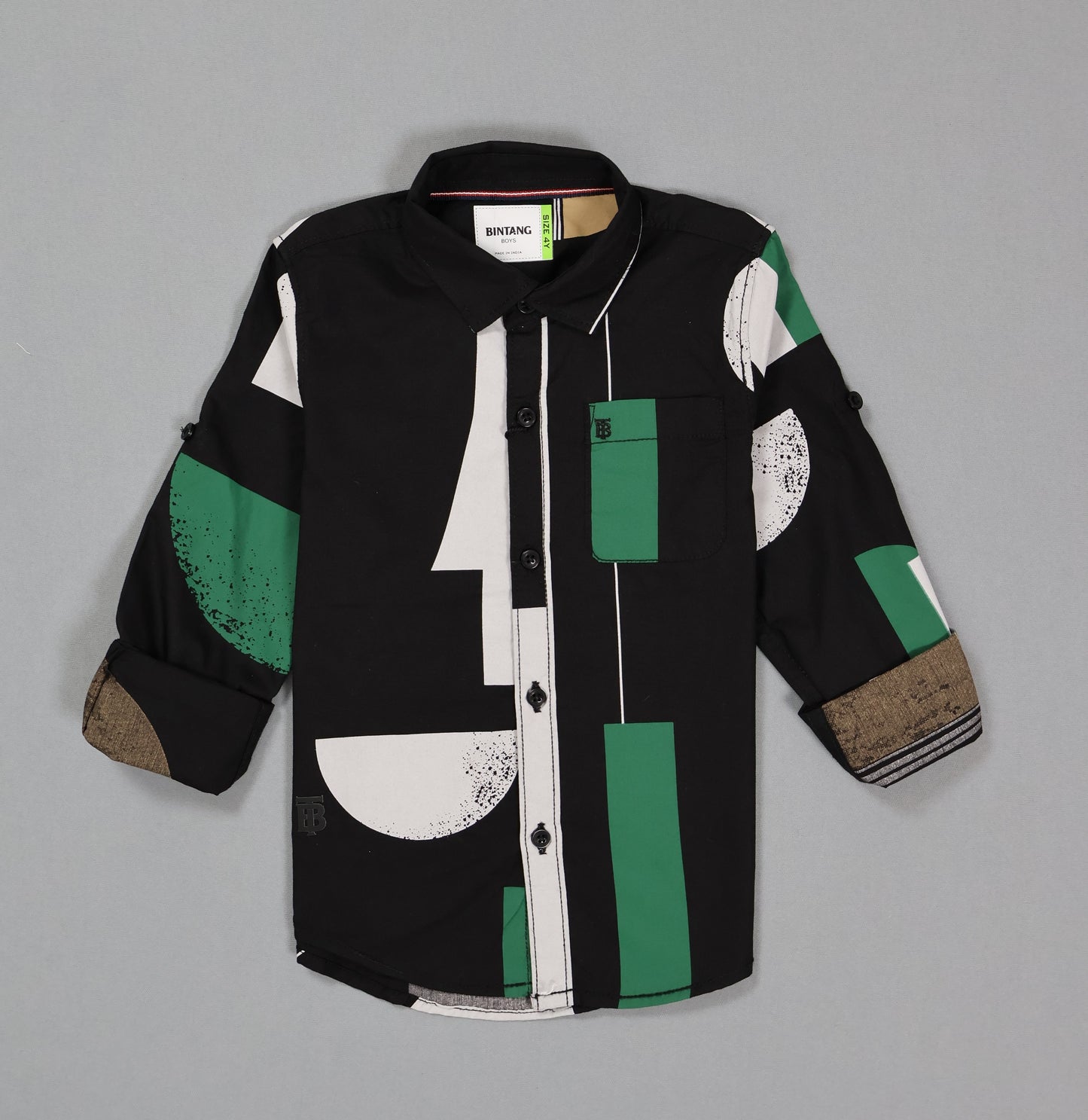 Kids black shirt with green and white geometric print, long sleeves, button front