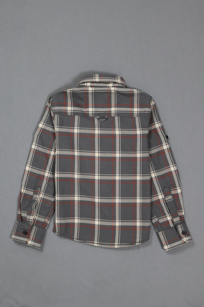 Plaid shirt with gray, red, and white pattern on a gray background