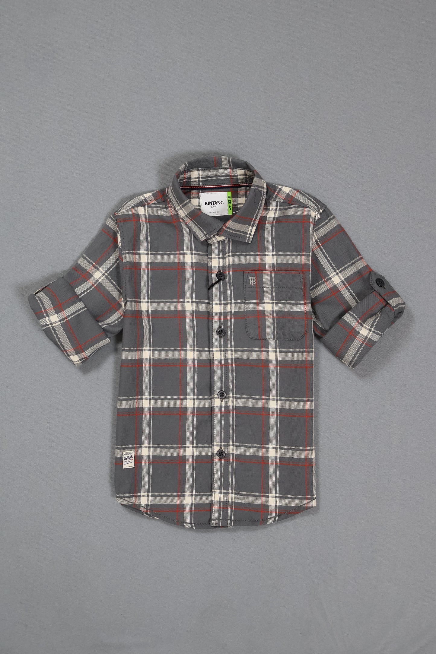 Plaid shirt with gray, red, and white pattern on a gray background