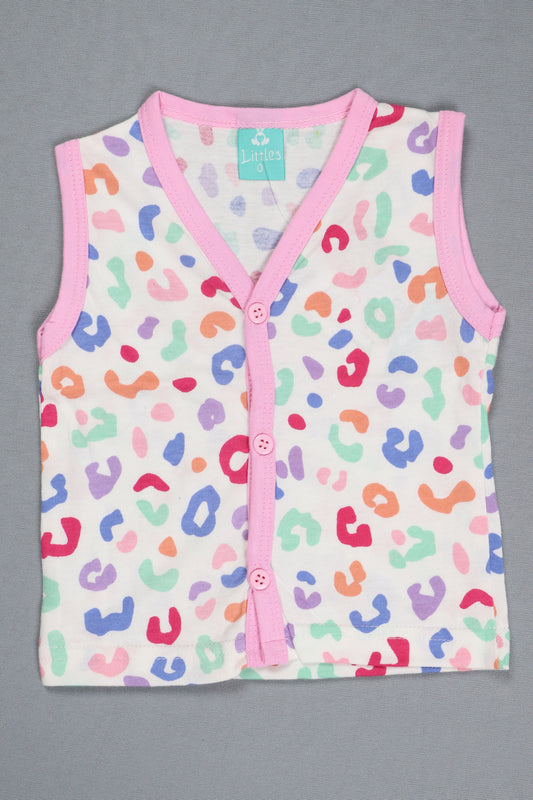 Baby romper with colorful leopard print and pink trim on a gray background