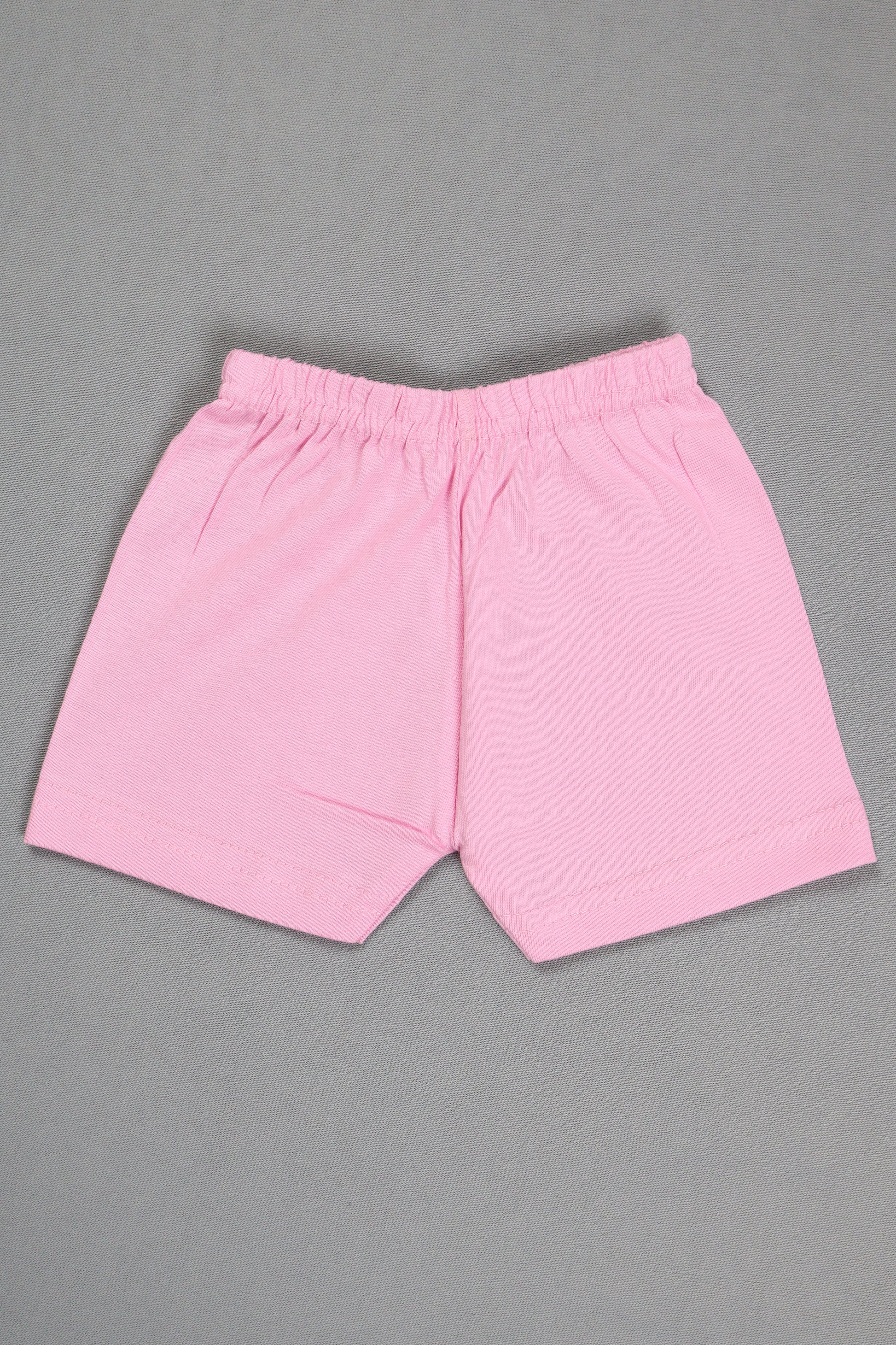 Pink shorts on a gray background