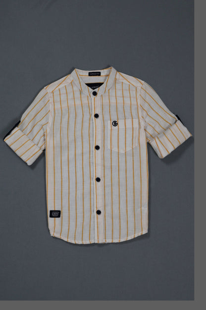 Striped shirt with black buttons on a gray background