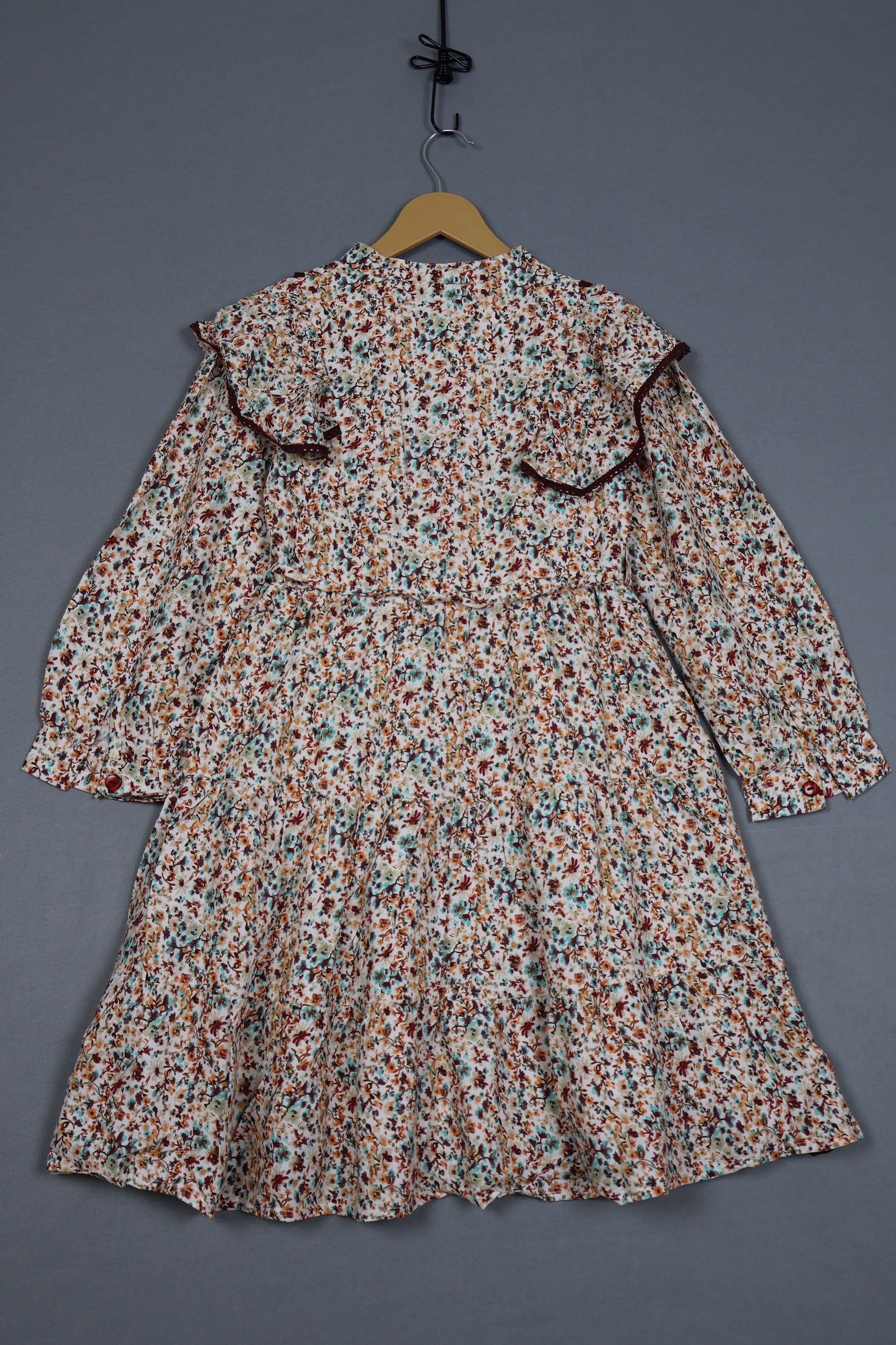 Floral patterned shirt on a gray background
