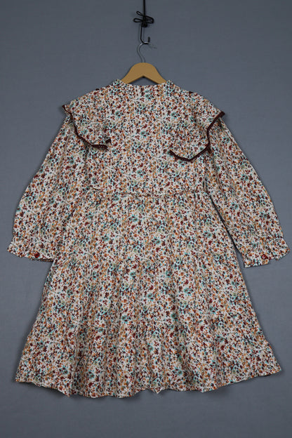 Floral patterned shirt on a gray background