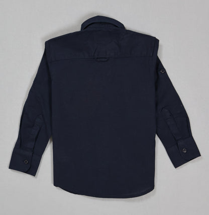 Navy blue shirt on a light gray background