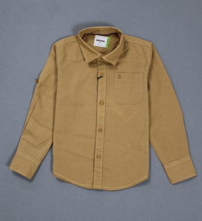 Brown shirt with a collar and pocket on a gray background